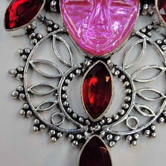 Sterling Silver Pendant with Pink Carved Face and Garnet Accents - Picture 7 of 10